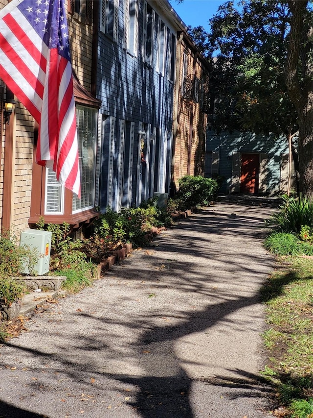 view of property exterior with brick siding