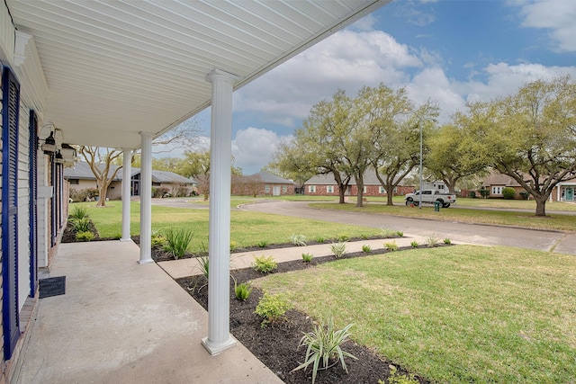 view of yard featuring a residential view