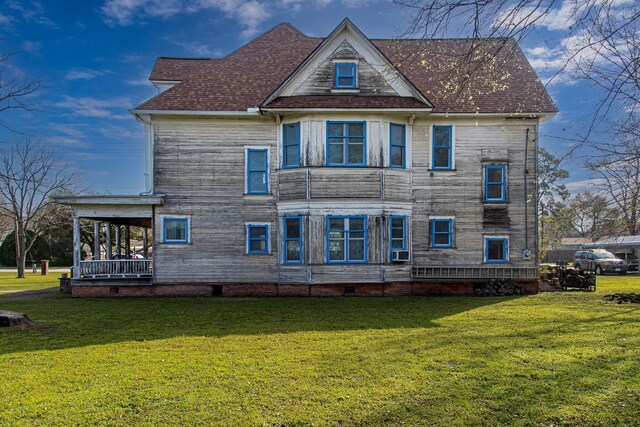 406 7th St, Sealy, TX 77474 - back of house with a lawn, cooling unit, and crawl space