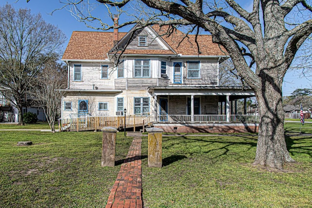 406 7th St, Sealy, TX 77474 - victorian home with a porch and a front lawn