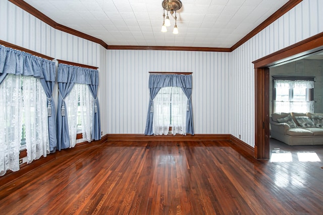 406 7th St, Sealy, TX 77474 - unfurnished room featuring plenty of natural light, wood finished floors, and ornamental molding