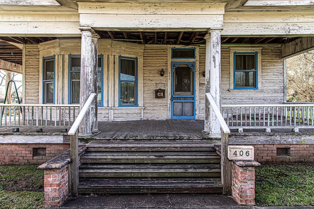 406 7th St, Sealy, TX 77474 - doorway to property featuring a porch