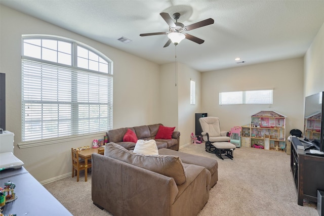 120 Shane St, Montgomery, TX 77316 - carpeted living room with ceiling fan and baseboards