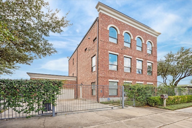 view of property featuring a fenced front yard