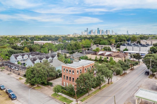 drone / aerial view featuring a city view