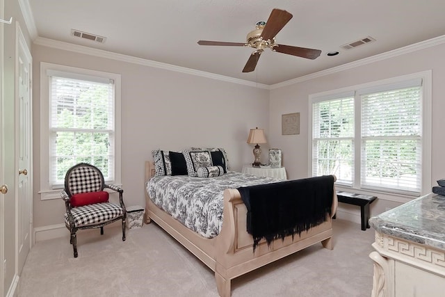 bedroom featuring crown molding, visible vents, and light carpet