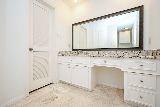 12219 Gladewick Dr, Houston, TX 77077 - bathroom with vanity and baseboards