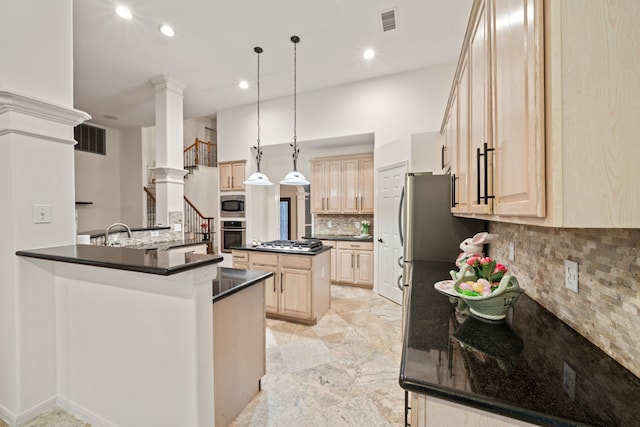 6307 Shoreview Ct, Humble, TX 77346 - kitchen featuring dark countertops, light brown cabinets, stainless steel appliances, and visible vents