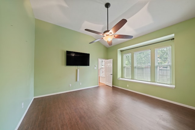 6307 Shoreview Ct, Humble, TX 77346 - unfurnished living room featuring baseboards, lofted ceiling, wood finished floors, and a ceiling fan