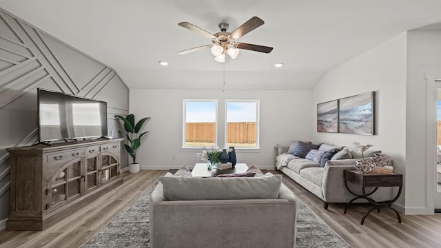 13913 Bahia Bay, Texas City, TX 77591 - living room featuring a ceiling fan, light wood finished floors, lofted ceiling, baseboards, and recessed lighting