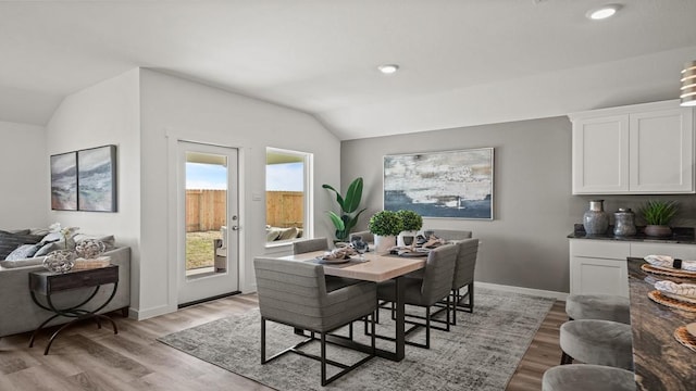 13913 Bahia Bay, Texas City, TX 77591 - dining space with lofted ceiling, light wood-type flooring, recessed lighting, and baseboards