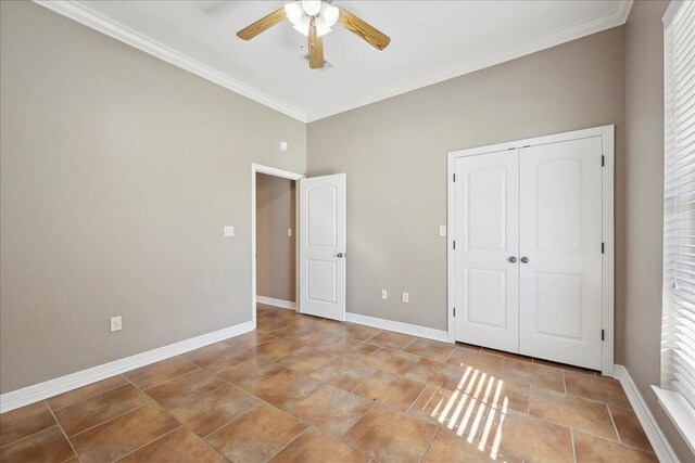7403 S Park Rd, Lumberton, TX 77657 - unfurnished bedroom featuring a closet, a ceiling fan, baseboards, and ornamental molding