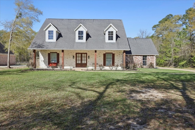7403 S Park Rd, Lumberton, TX 77657 - cape cod home featuring roof with shingles, a porch, and a front lawn