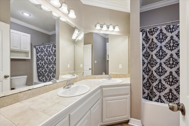 7403 S Park Rd, Lumberton, TX 77657 - full bath featuring double vanity, ornamental molding, toilet, and a sink