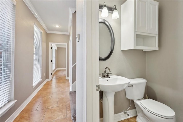 7403 S Park Rd, Lumberton, TX 77657 - half bathroom with baseboards, toilet, crown molding, and tile patterned flooring
