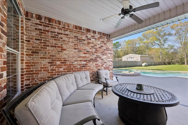 7403 S Park Rd, Lumberton, TX 77657 - view of patio / terrace with an outdoor hangout area, a pool with connected hot tub, a ceiling fan, and fence