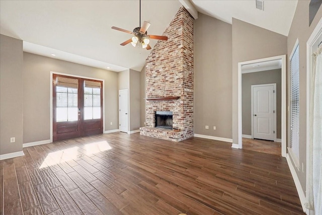 7403 S Park Rd, Lumberton, TX 77657 - unfurnished living room with french doors, baseboards, dark wood finished floors, and a ceiling fan