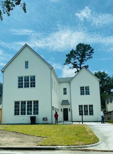 7203 Tickner St, Houston, TX 77055 - rear view of house with stucco siding