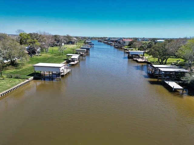 exterior space featuring boat lift and a dock