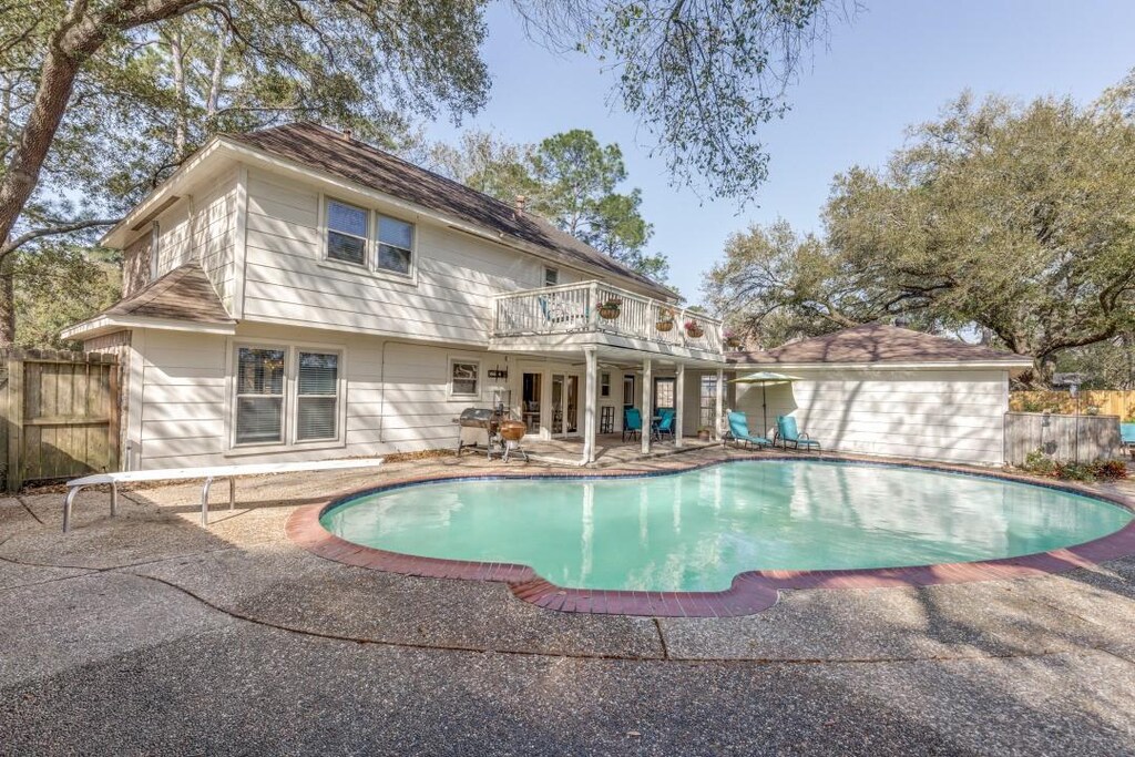 view of pool with a patio, fence, and a fenced in pool