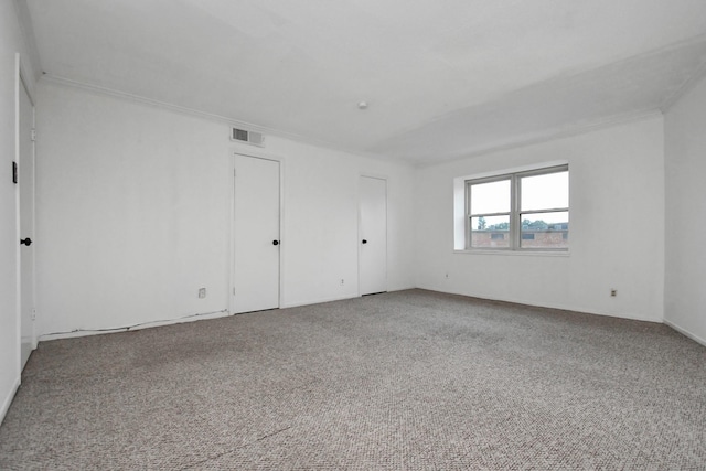 11525 Burdine St Unit 421, Houston, TX 77035 - empty room featuring visible vents, crown molding, and carpet