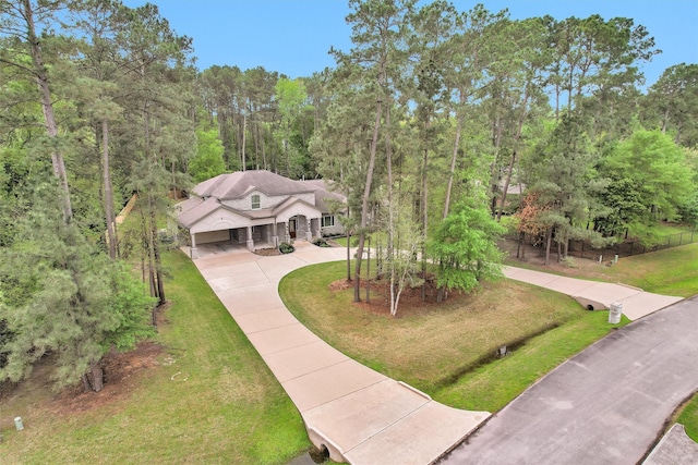 4106 Tee Tree Ct, Spring, TX 77386 - view of subject property featuring a heavily wooded area