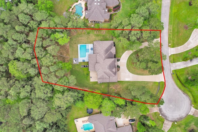 4106 Tee Tree Ct, Spring, TX 77386 - aerial view of property and surrounding area featuring a pool and property parcel outlined