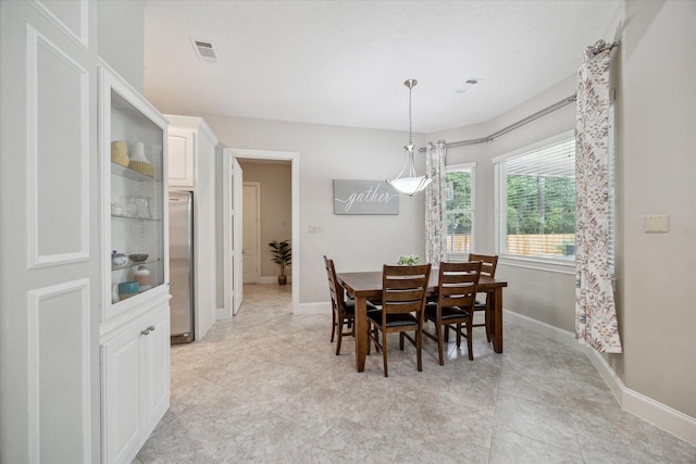 4106 Tee Tree Ct, Spring, TX 77386 - dining space featuring baseboards and light tile patterned floors