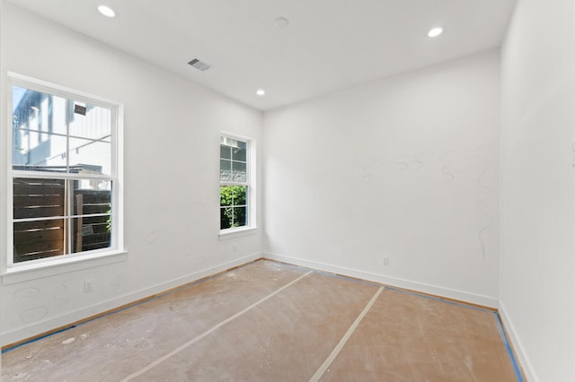 2932 Michaux St, Houston, TX 77009 - spare room featuring baseboards and recessed lighting