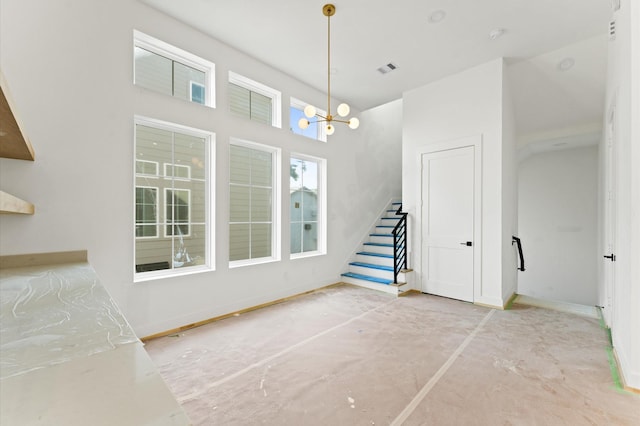 2932 Michaux St, Houston, TX 77009 - interior space featuring stairs, a chandelier, and baseboards