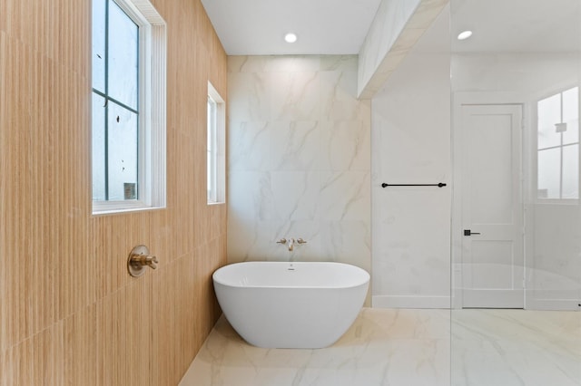 2932 Michaux St, Houston, TX 77009 - full bath with a freestanding bath and marble finish flooring
