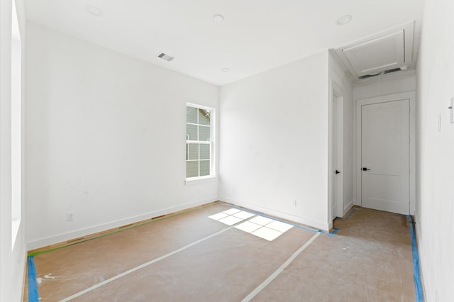 2932 Michaux St, Houston, TX 77009 - unfurnished room featuring attic access and baseboards