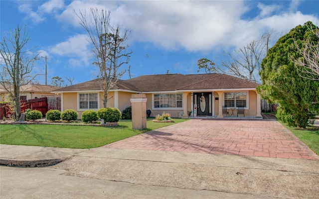 1421 Glenmore Forest St, Houston, TX 77055 - single story home with a front yard, decorative driveway, fence, and stucco siding