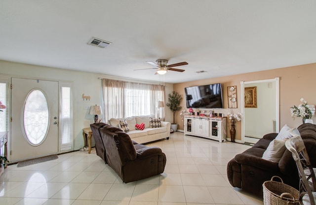 1421 Glenmore Forest St, Houston, TX 77055 - living area with light tile patterned flooring, visible vents, a baseboard heating unit, and ceiling fan