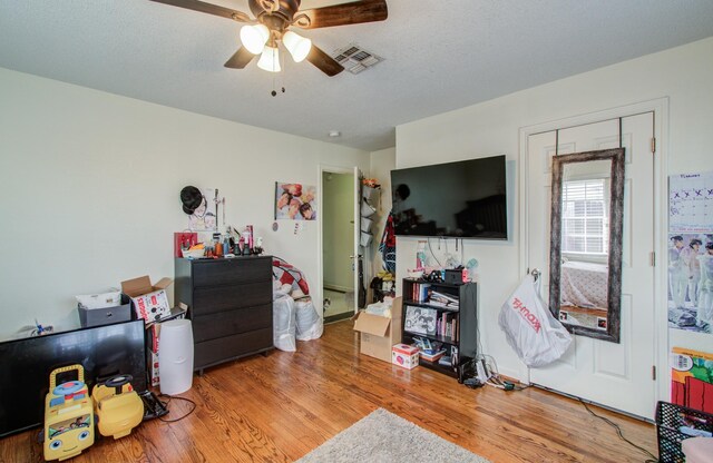 1421 Glenmore Forest St, Houston, TX 77055 - interior space featuring visible vents, a textured ceiling, and wood finished floors