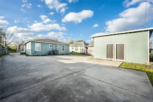 1719 Lombardy St, Houston, TX 77023 - back of property featuring fence and central AC unit