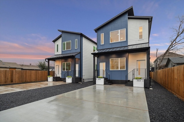 3504 Delhi St B, Unit A, Houston, TX 77022 - view of front of home featuring a standing seam roof and metal roof