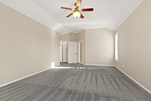 spare room with carpet flooring, baseboards, ceiling fan, ornamental molding, and lofted ceiling