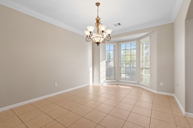 empty room with baseboards, visible vents, crown molding, and a chandelier
