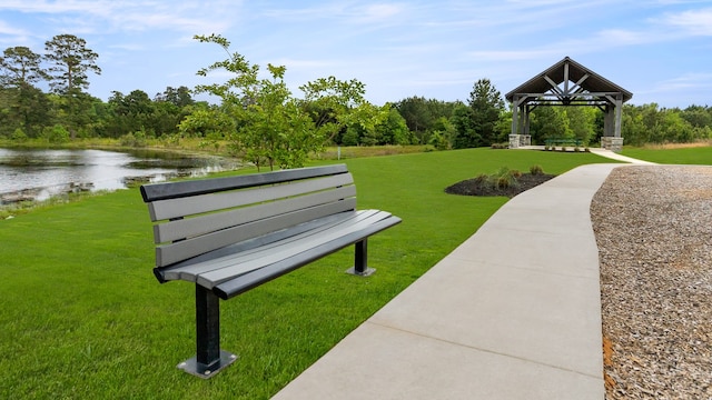42706 Mystery Ln, Magnolia, TX 77354 - view of home's community with a gazebo, a water view, and a lawn