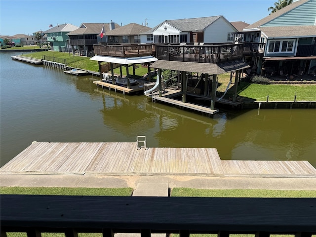 34 N Omega St, Galveston, TX 77568 - dock featuring a water view and a residential view
