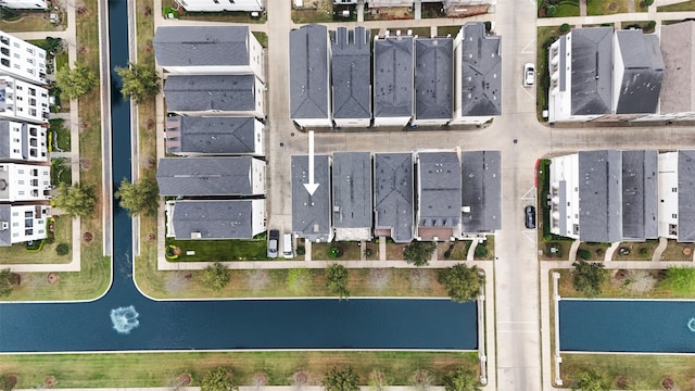 bird's eye view with a water view