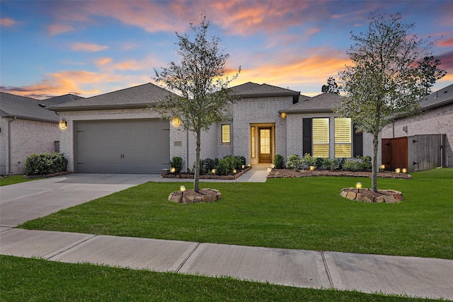 122 S Wild Petunia Trl, Montgomery, TX 77316 - view of front of property with an attached garage, concrete driveway, and brick siding