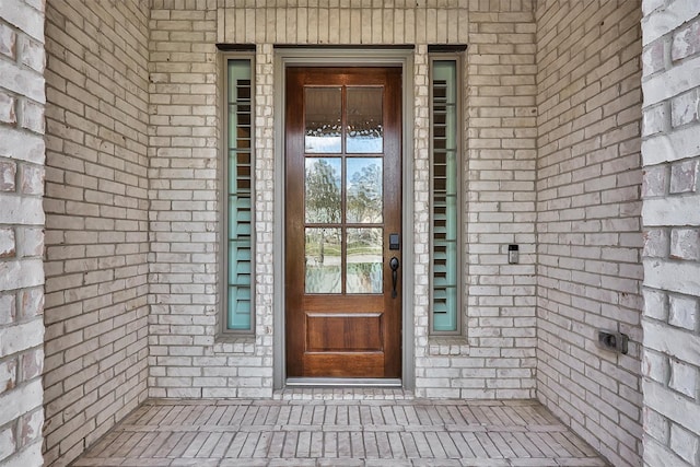 122 S Wild Petunia Trl, Montgomery, TX 77316 - property entrance with brick siding