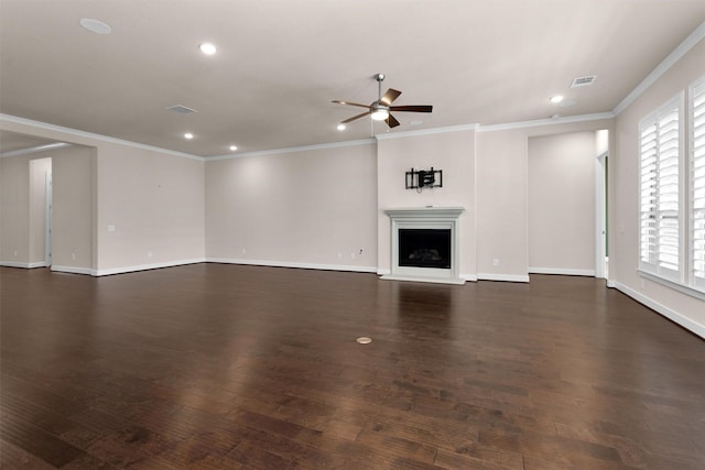 122 S Wild Petunia Trl, Montgomery, TX 77316 - unfurnished living room featuring a ceiling fan, recessed lighting, dark wood-type flooring, a fireplace with raised hearth, and baseboards
