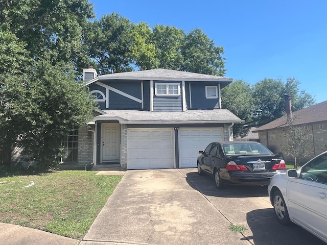 view of front facade with driveway, an attached garage, a chimney, and a front lawn