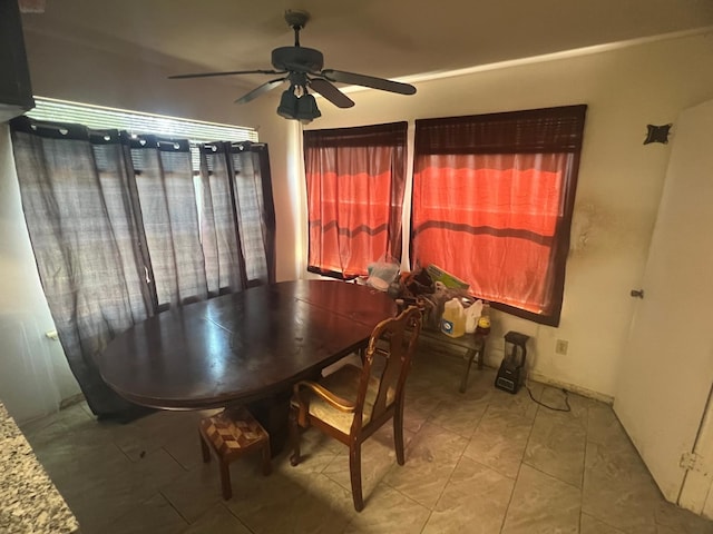 dining area featuring ceiling fan
