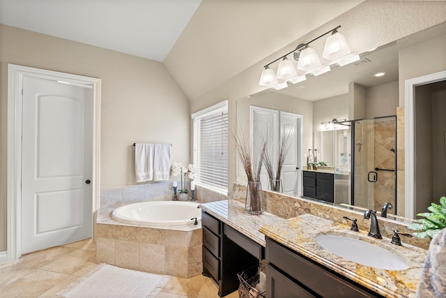 30614 Indigo Falls Dr, Brookshire, TX 77423 - bathroom featuring lofted ceiling, vanity, tile patterned floors, a shower stall, and a garden tub