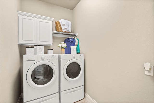30614 Indigo Falls Dr, Brookshire, TX 77423 - laundry area featuring cabinet space, washer and clothes dryer, and baseboards