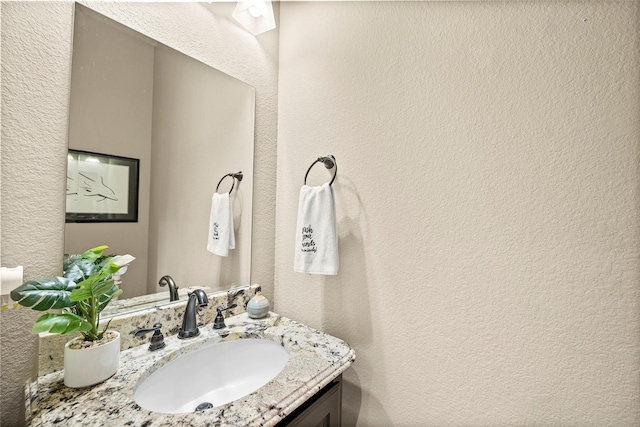 30614 Indigo Falls Dr, Brookshire, TX 77423 - bathroom featuring vanity and a textured wall